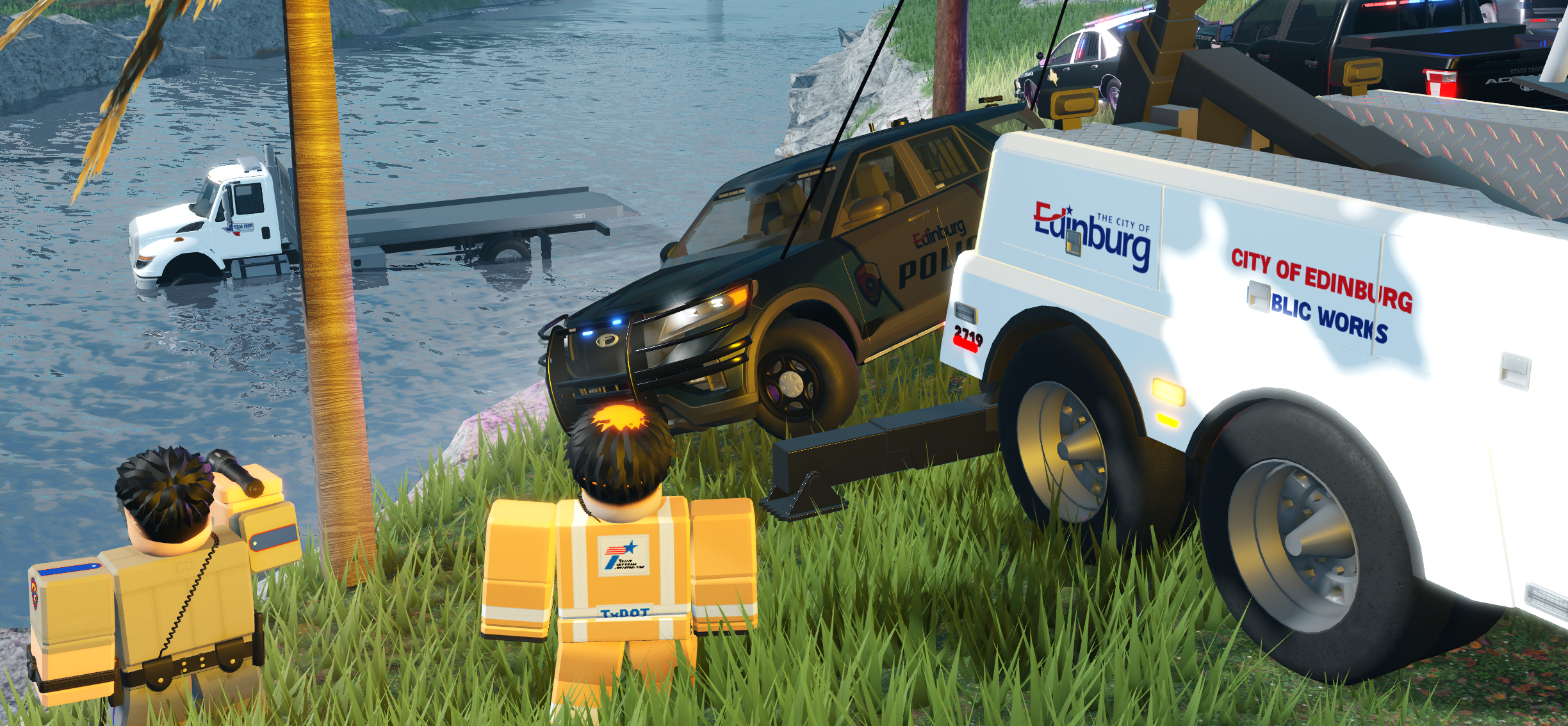 Edinburg Public Works recovering an EPD vehicle from the water